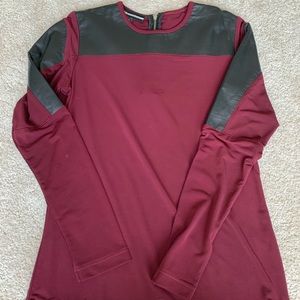 Red sweater with leather details